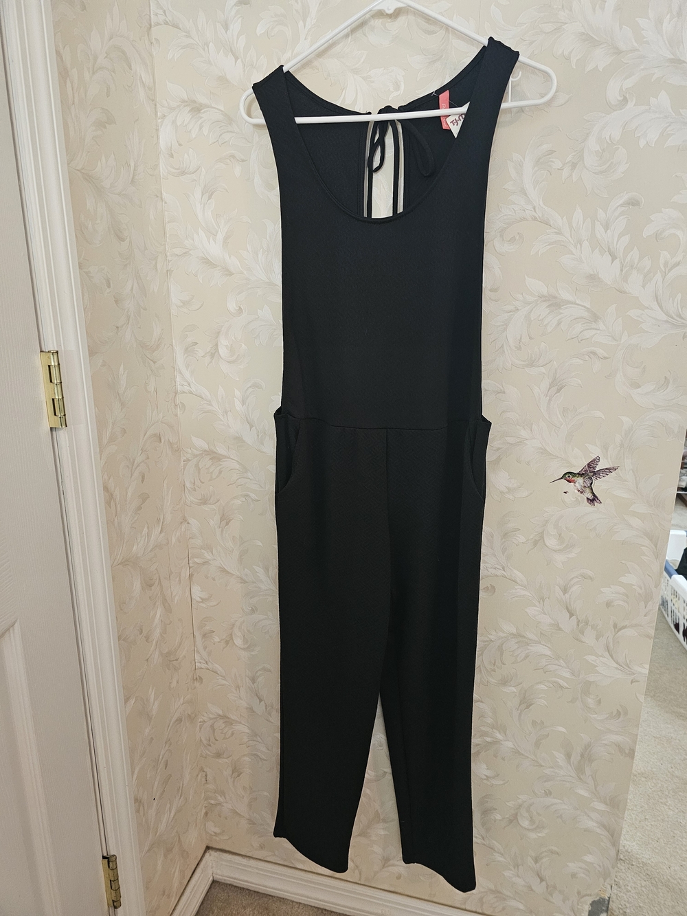 Sleek Black Sleeveless Jumpsuit with Back Tie